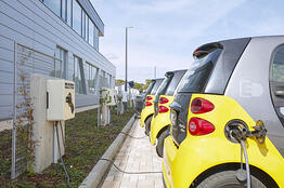 Electric vehicles charge on the company premises